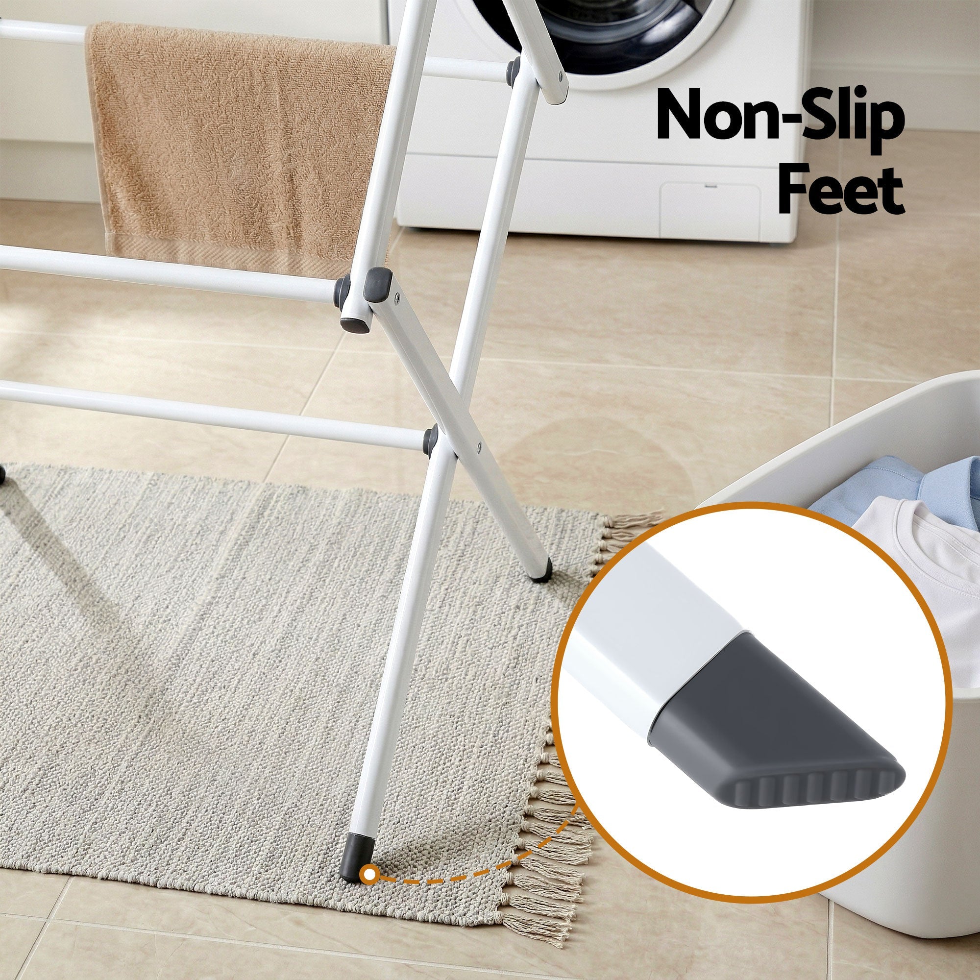 White clothes drying rack with non-slip feet and end caps on metal legs