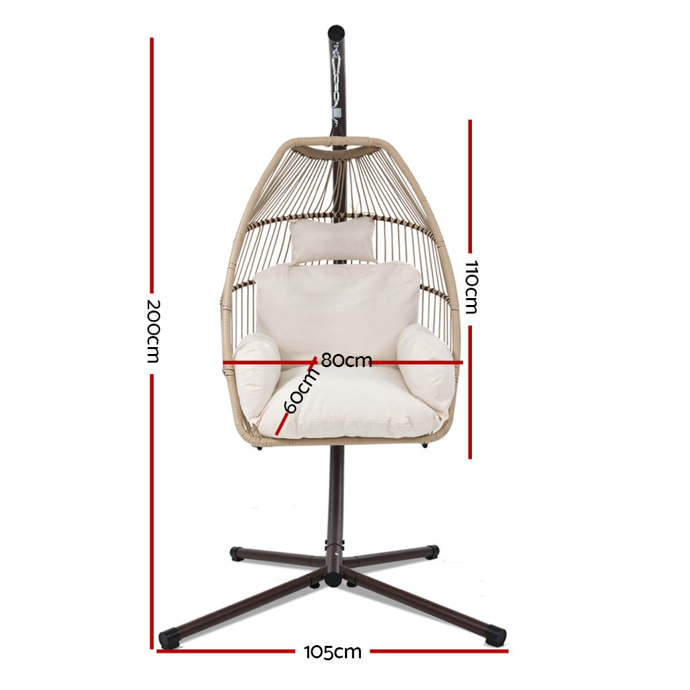 Wicker egg swing chair with beige cushion, shown with overall size dimensions