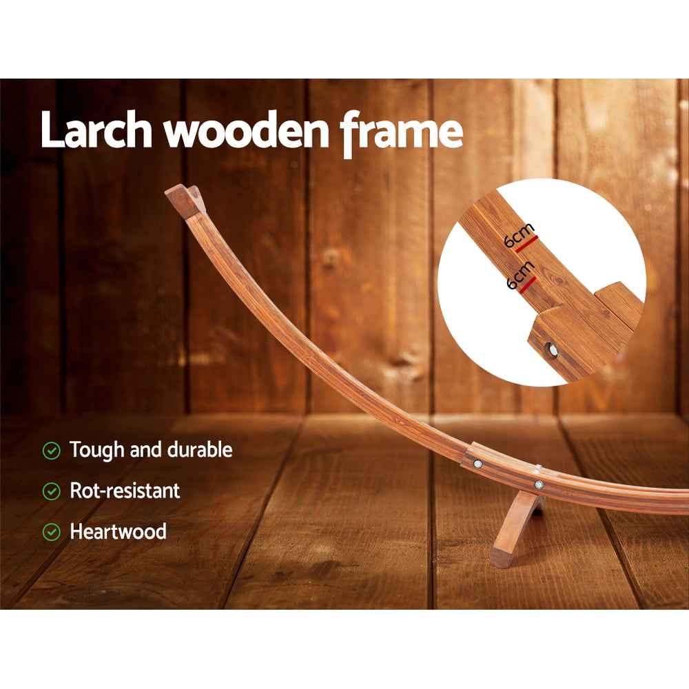 Curved larch wooden hammock frame with metal brackets and rope detail