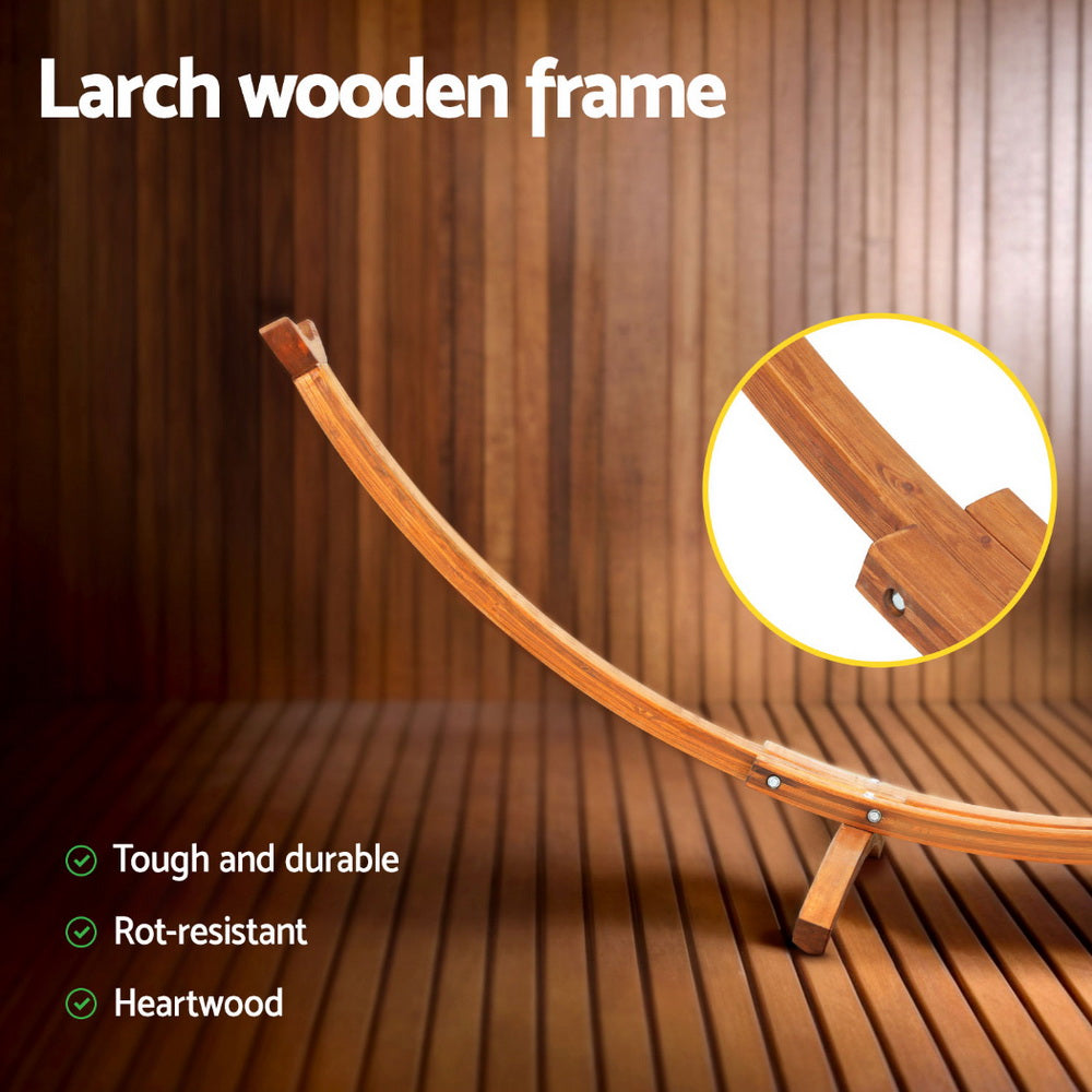 Larch wood curved hammock frame with visible bolts and angled end supports