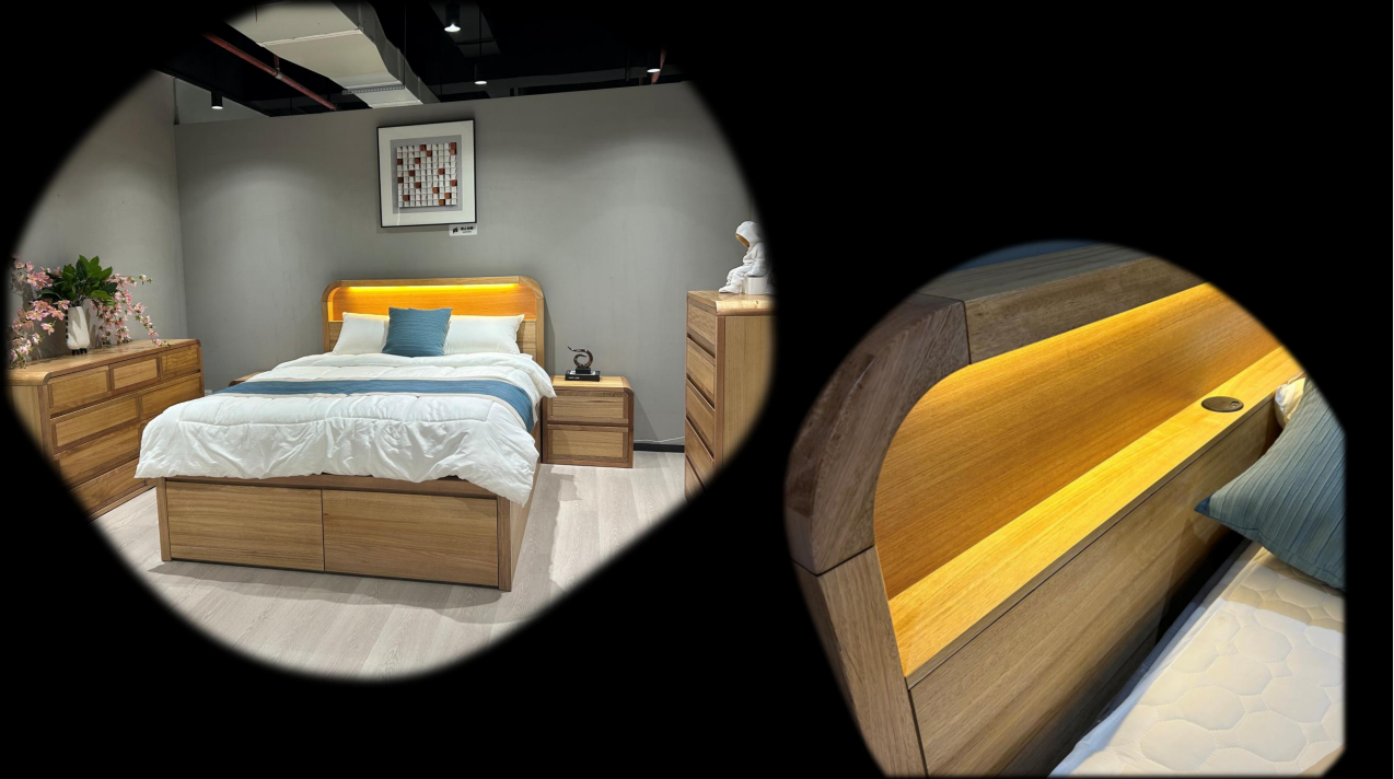 Bedroom setup with wooden bed and nightstands, featuring a round mirror reflection.