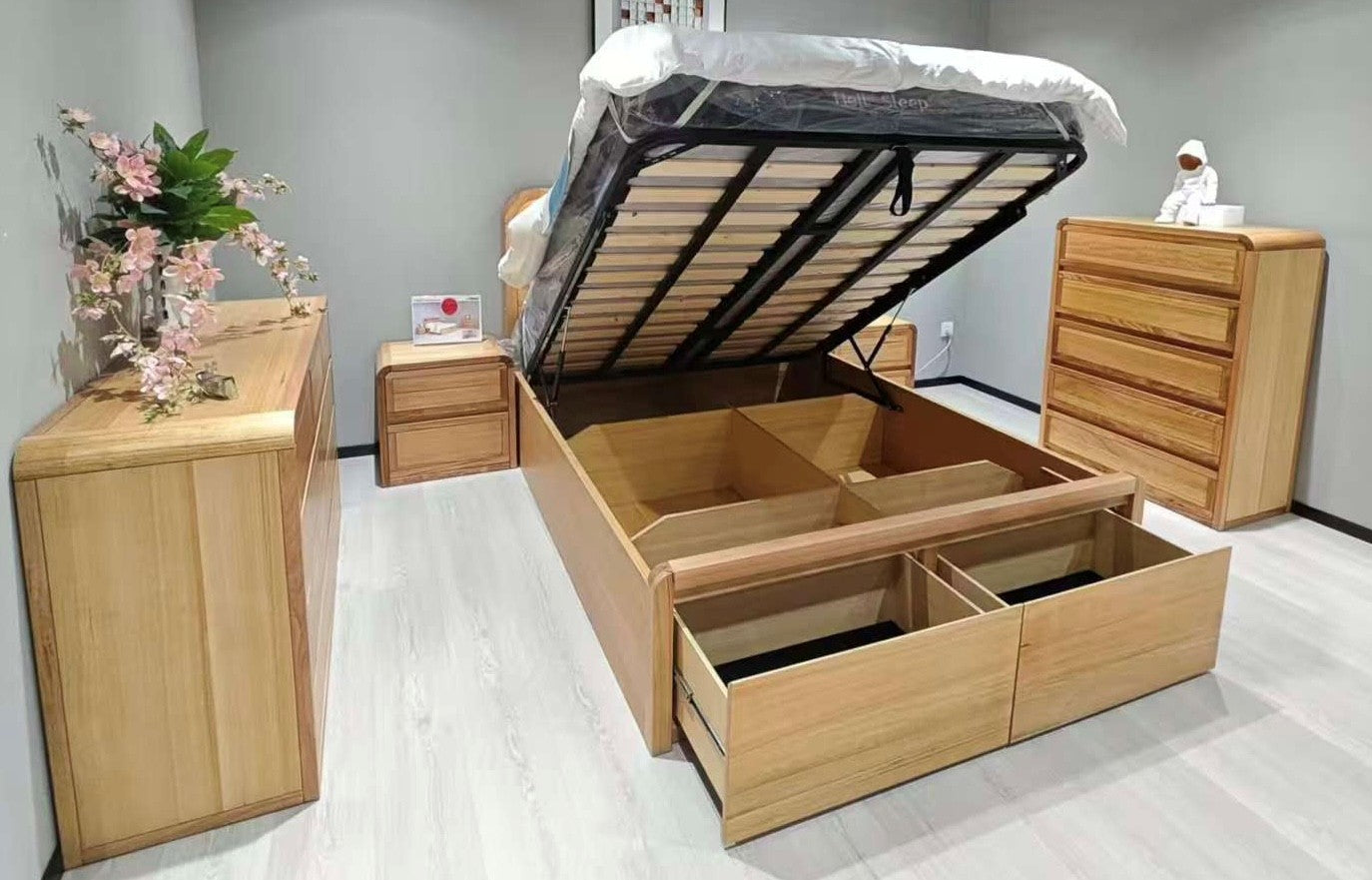 Wooden bed with storage drawers in a bedroom setting