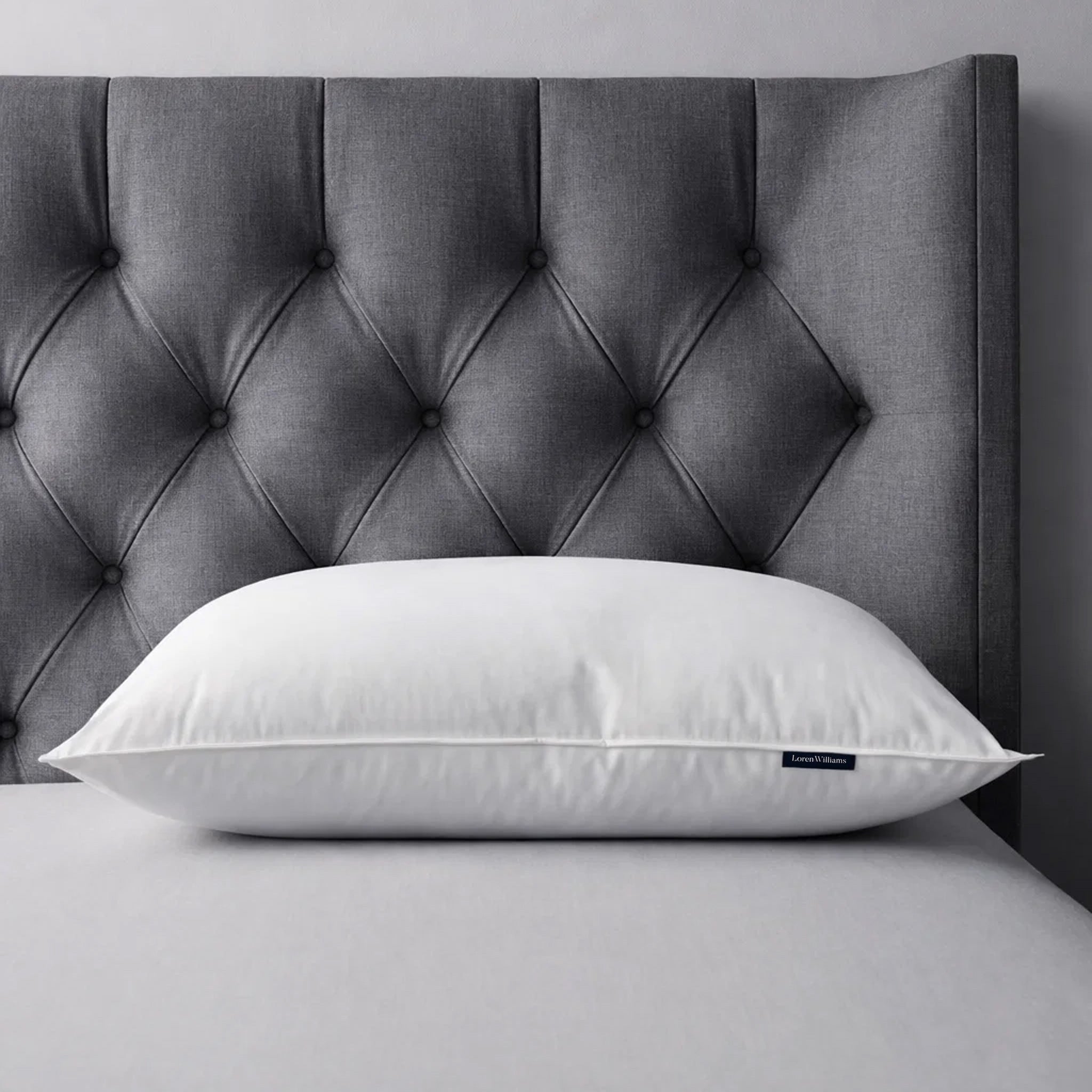 Hotel Classic Pillow with a breathable white cotton cover on a luxury bed setup