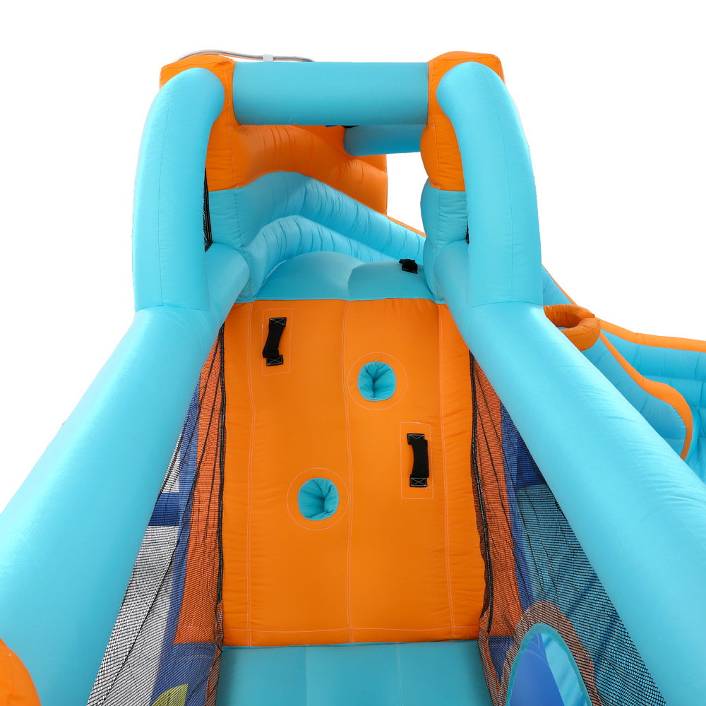 Inflatable water slide with orange play floor and blue slide chute side walls