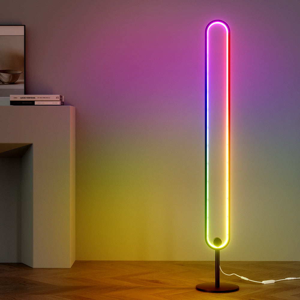 RGB LED floor lamp with tall arched light tube on round base, multicolor glow