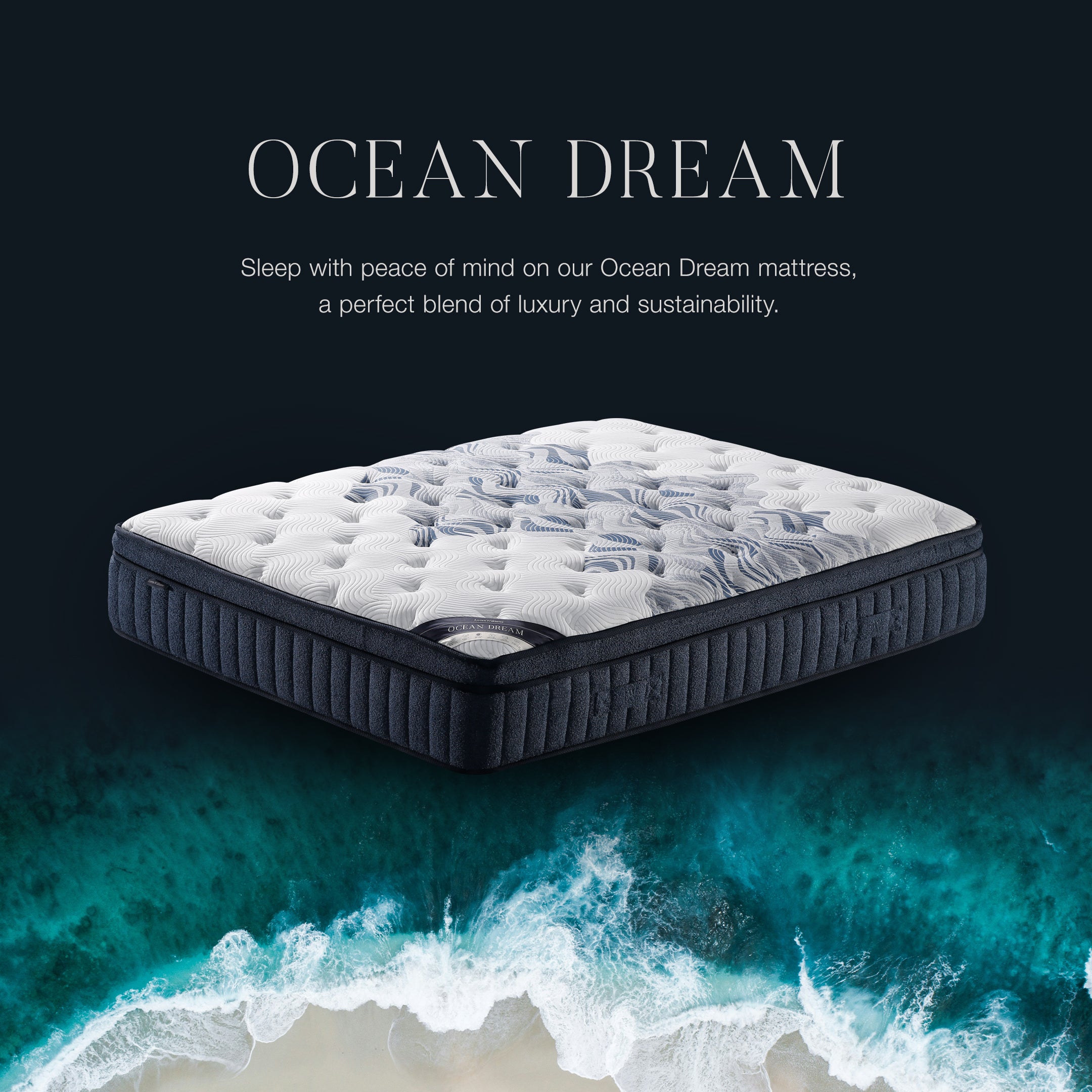 Dark blue mattress with tufted white surface and stitched blue pattern, angled view.
