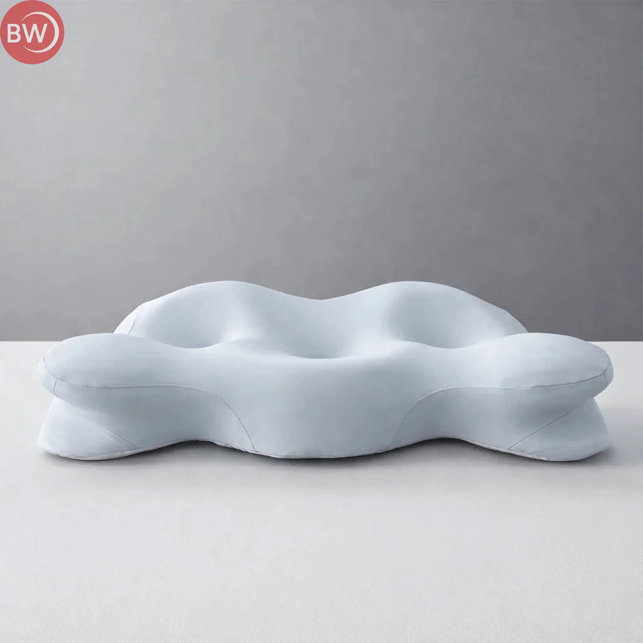 Light blue balance pillow with contoured wavy surface and support ridges