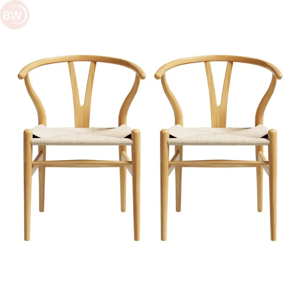 Set of two wood dining chairs with wishbone backs and beige upholstered seats