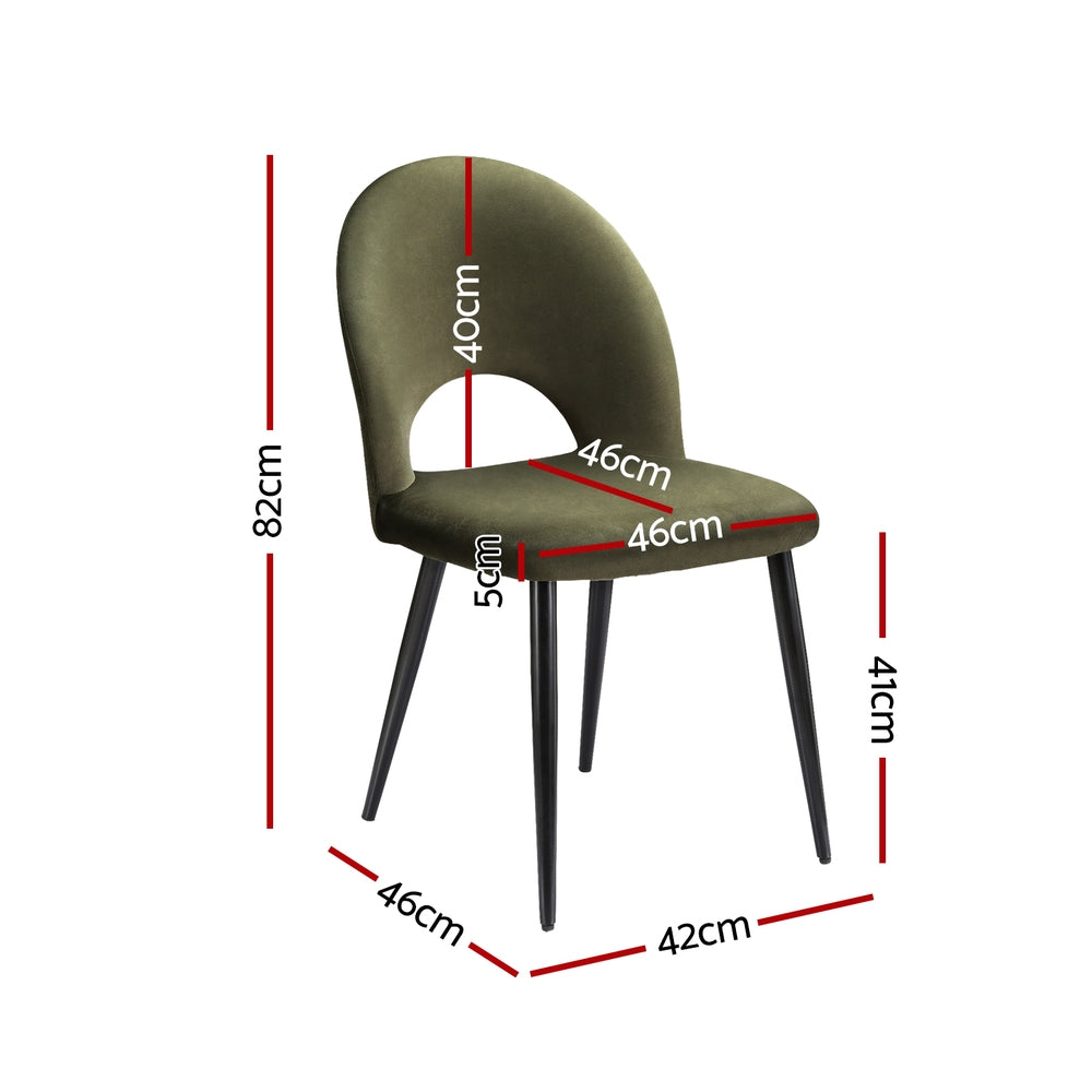 Velvet dining chair, olive green curved backrest, padded seat, four black tapered legs.