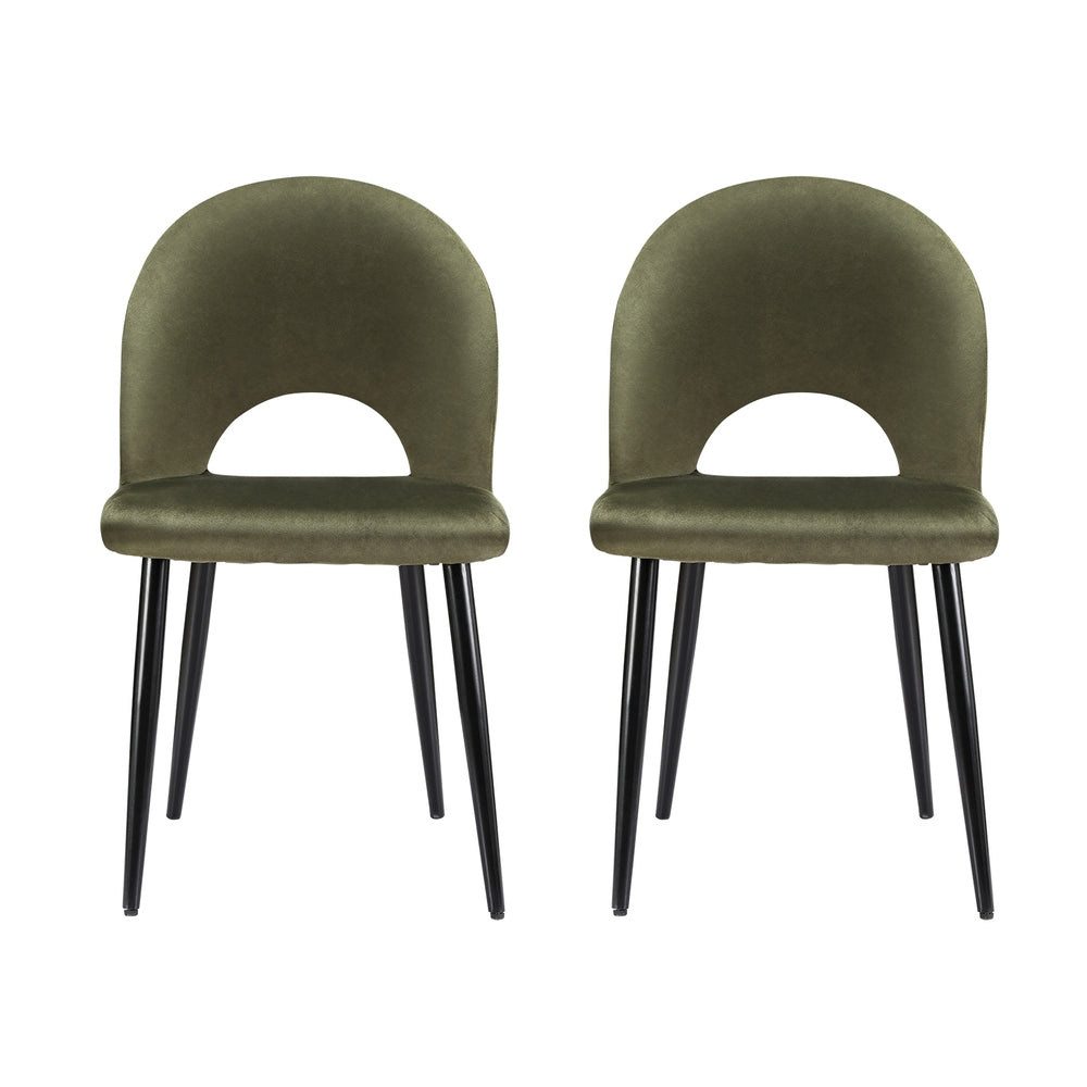 Set of 2 velvet dining chairs, olive green seats with curved cutout back, black legs.