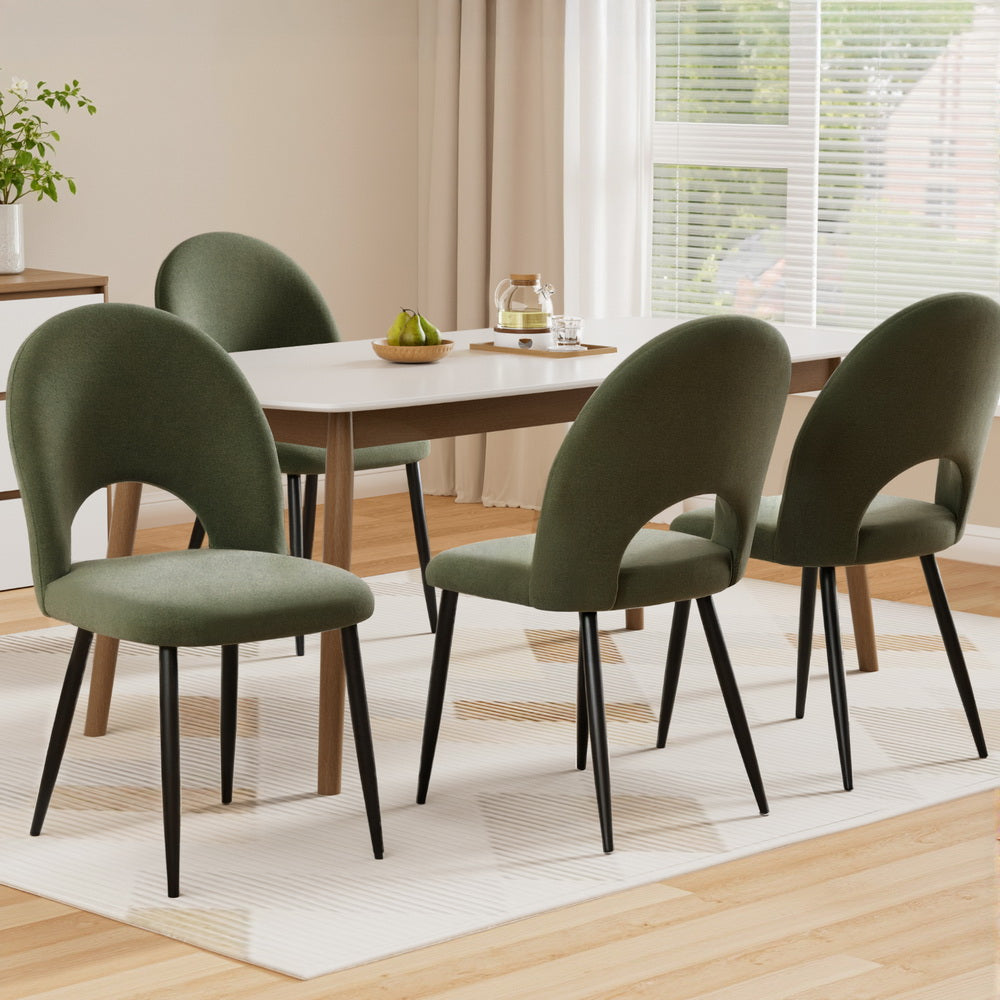 Set of 4 velvet dining chairs, olive green with curved cutout back and black legs