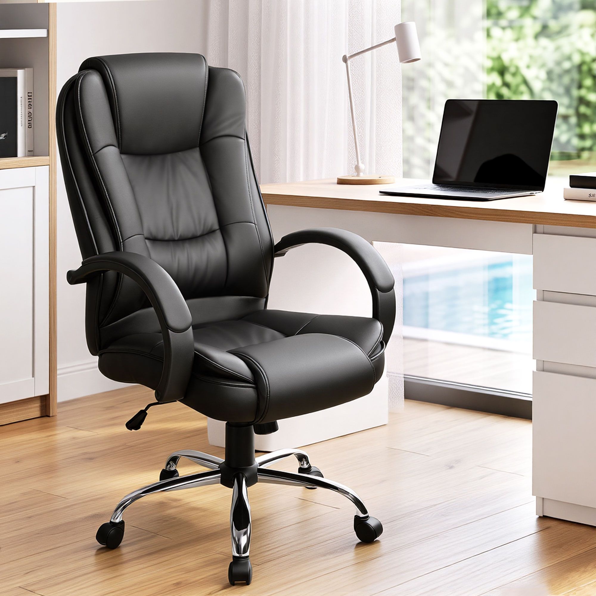 Black leather executive office chair with headrest, armrests, and chrome swivel base