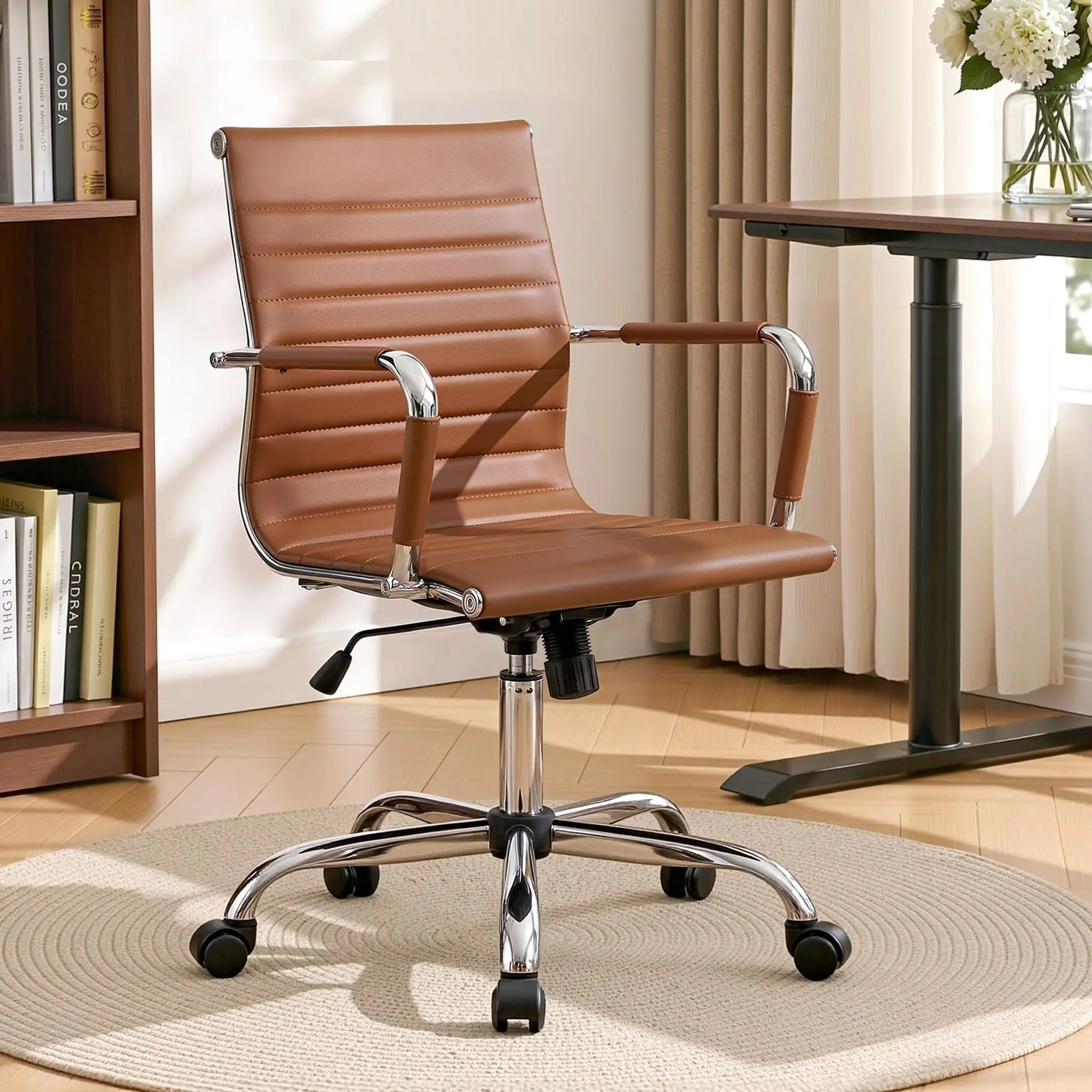 Brown PU leather mid-back office chair with armrests, chrome base, and swivel casters