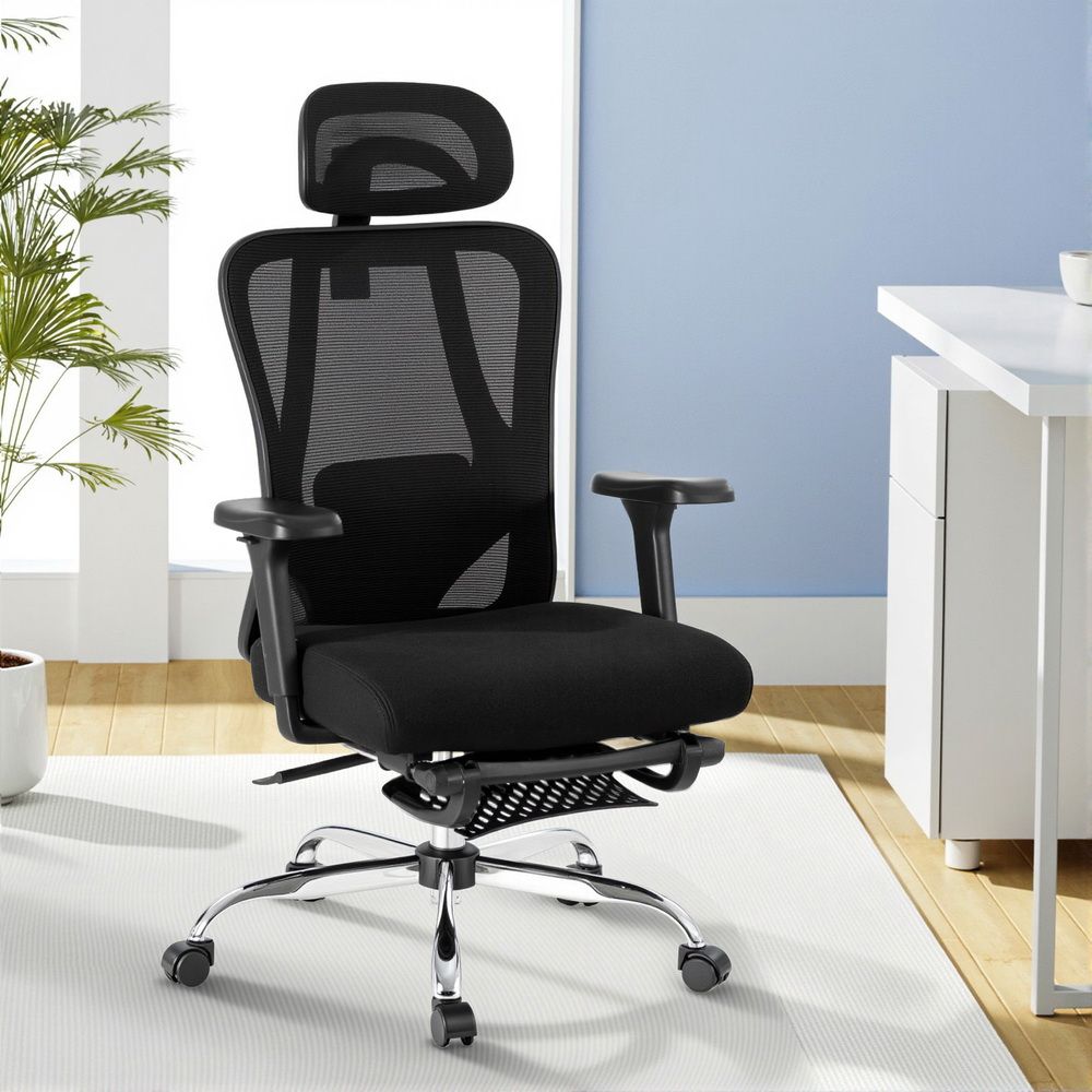 Black ergonomic mesh office chair with headrest, padded seat, armrests, and caster wheels