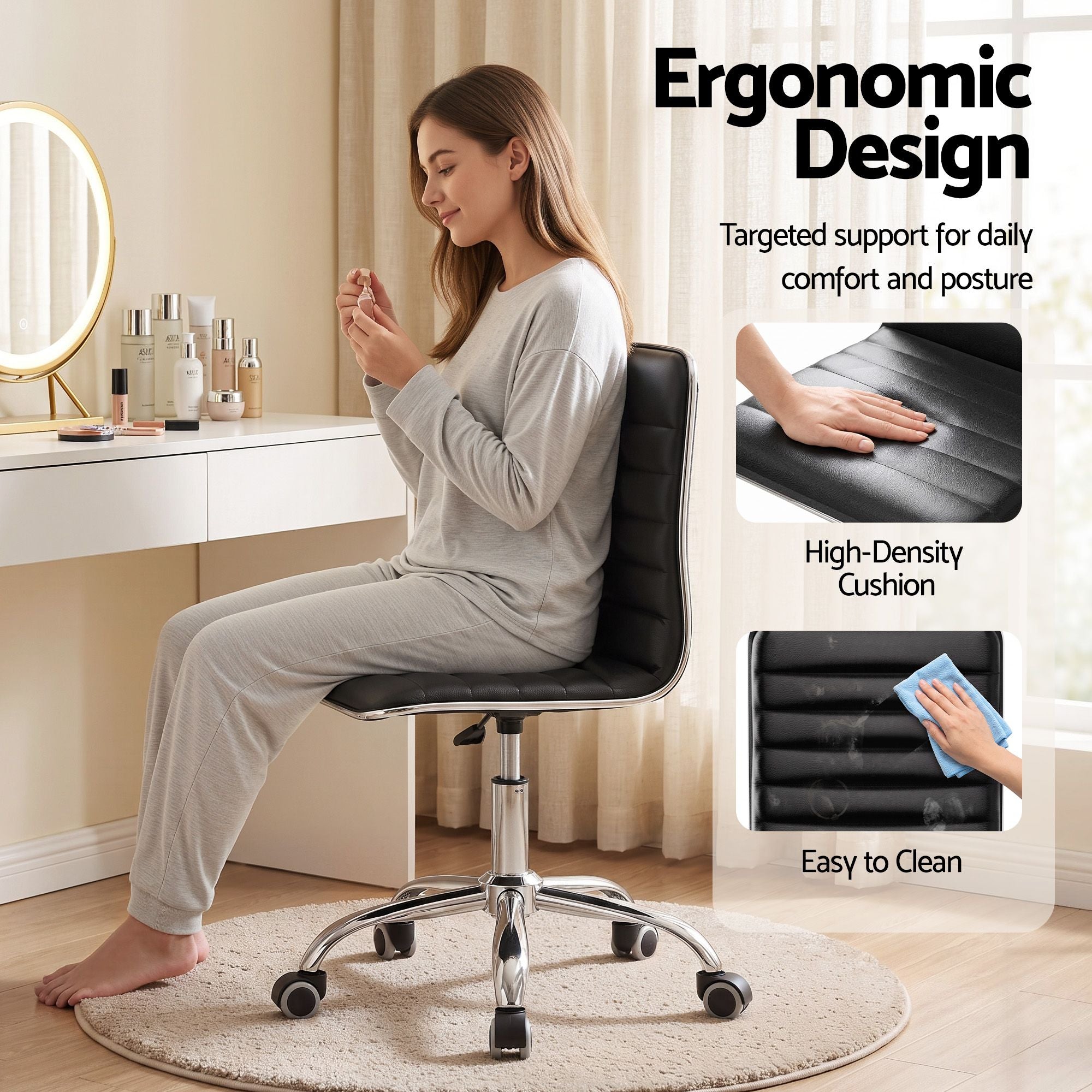 Black low-back PU office chair with quilted support, chrome base, caster wheels, and seat cushion