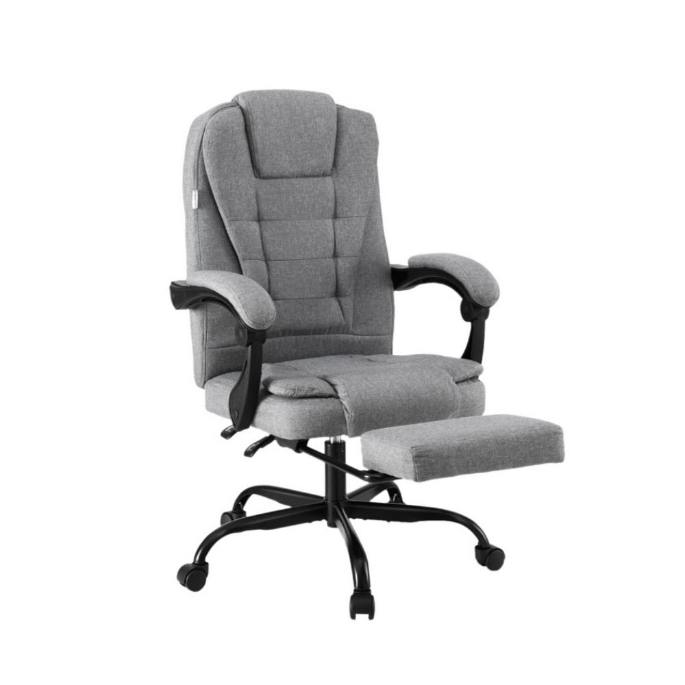 Gray upholstered office chair with extended footrest, padded arms, and swivel wheels