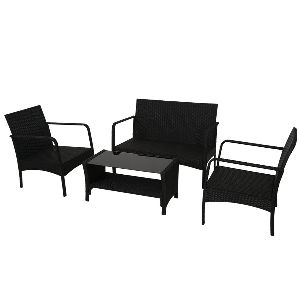 Outdoor wicker lounge set with loveseat, two armchairs, and rectangular glass-top table