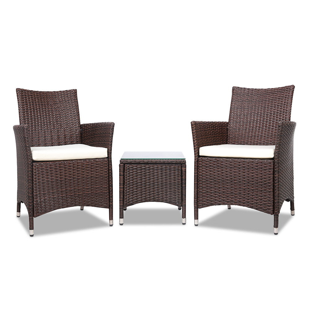 Outdoor bistro set with two dark brown wicker chairs and small glass-top table