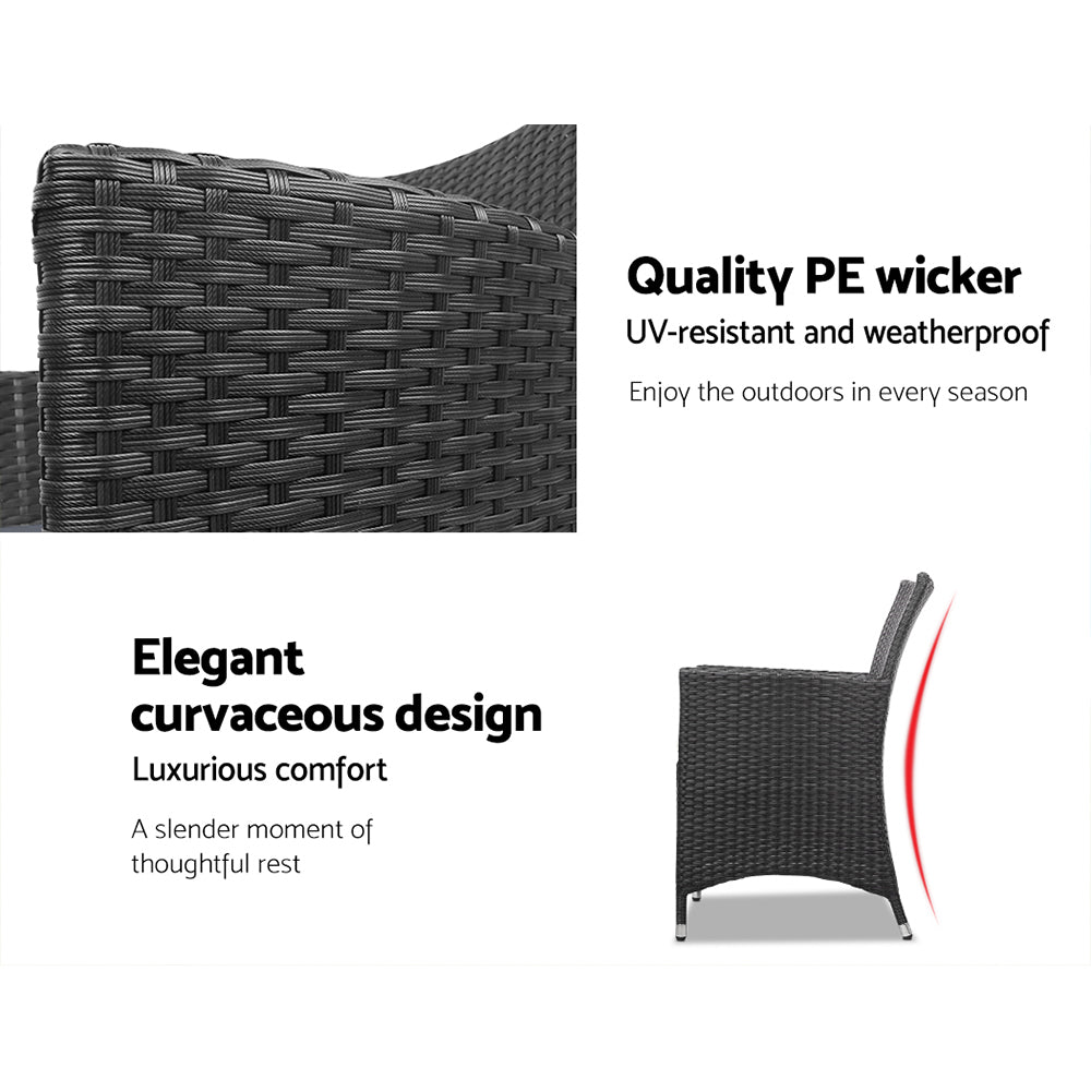 Dark PE wicker armchair with contoured back and gray cushion, curved armrests