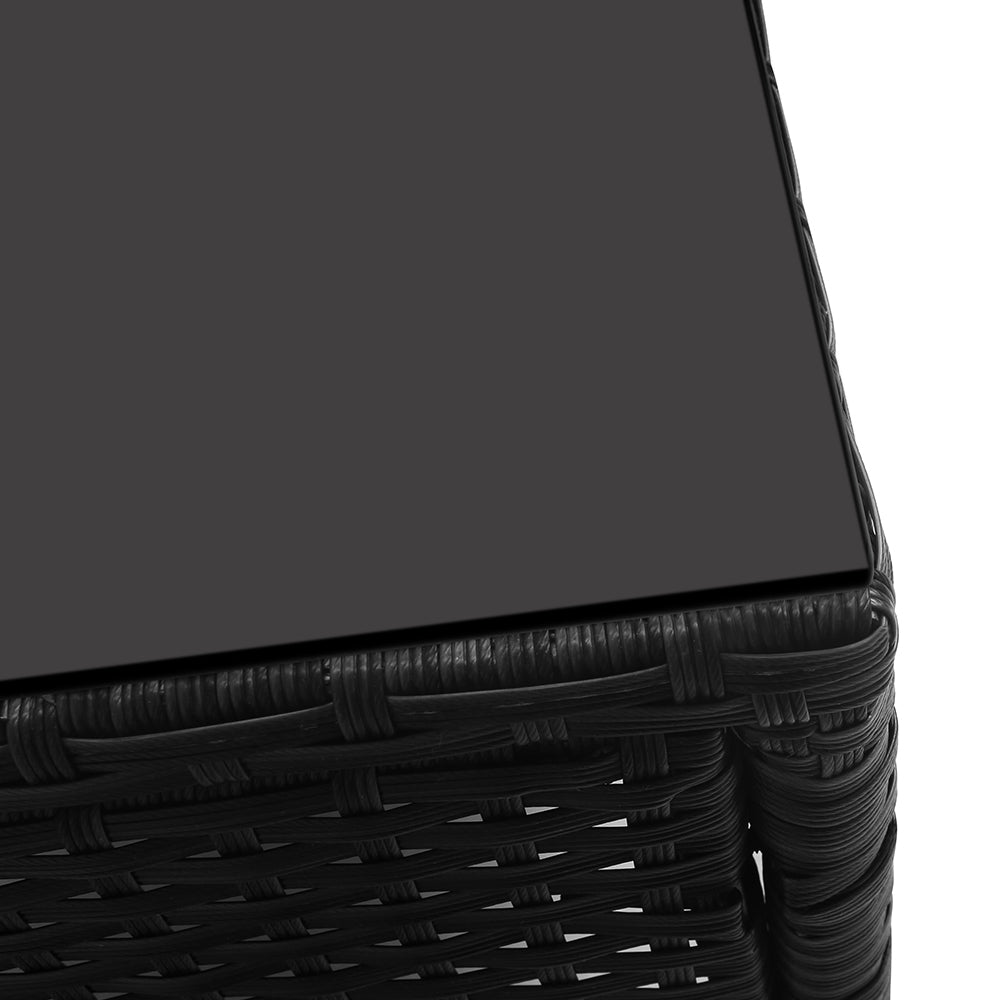 Close-up of dark woven wicker edge with a dark seat base