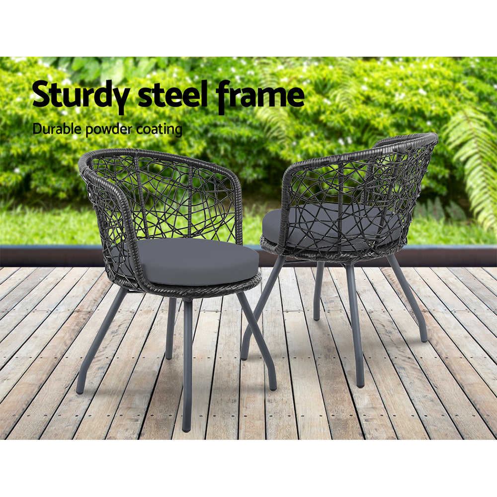 Two black woven patio chairs with gray cushions and dark steel legs