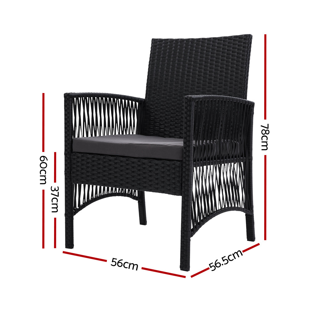 Outdoor lounge chair with dark woven wicker arms and gray seat cushion