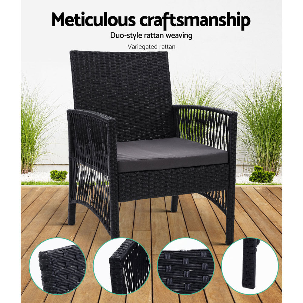Outdoor lounge chair with dark woven wicker texture and gray seat cushion