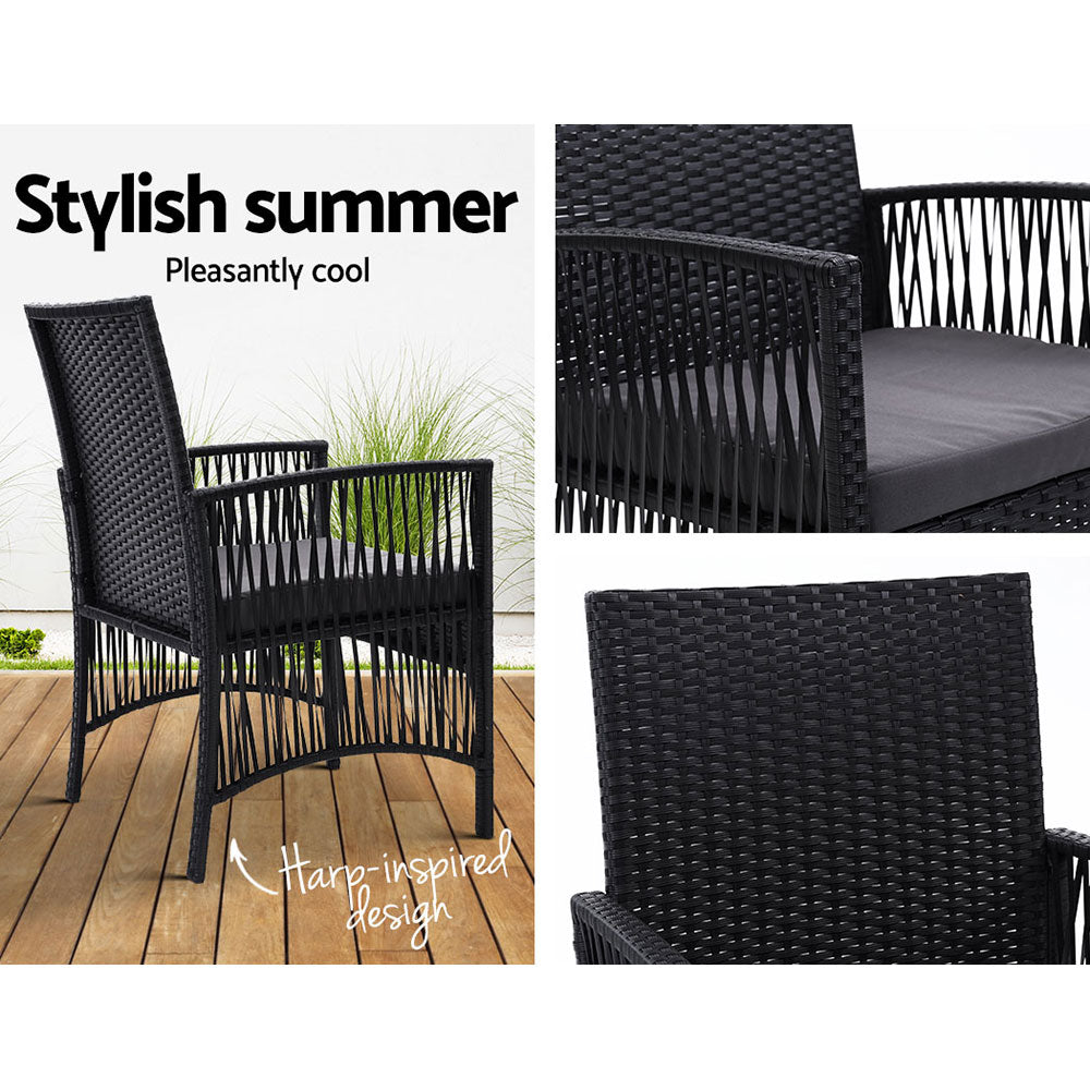 Outdoor lounge chair with dark woven backrest and gray padded seat cushion