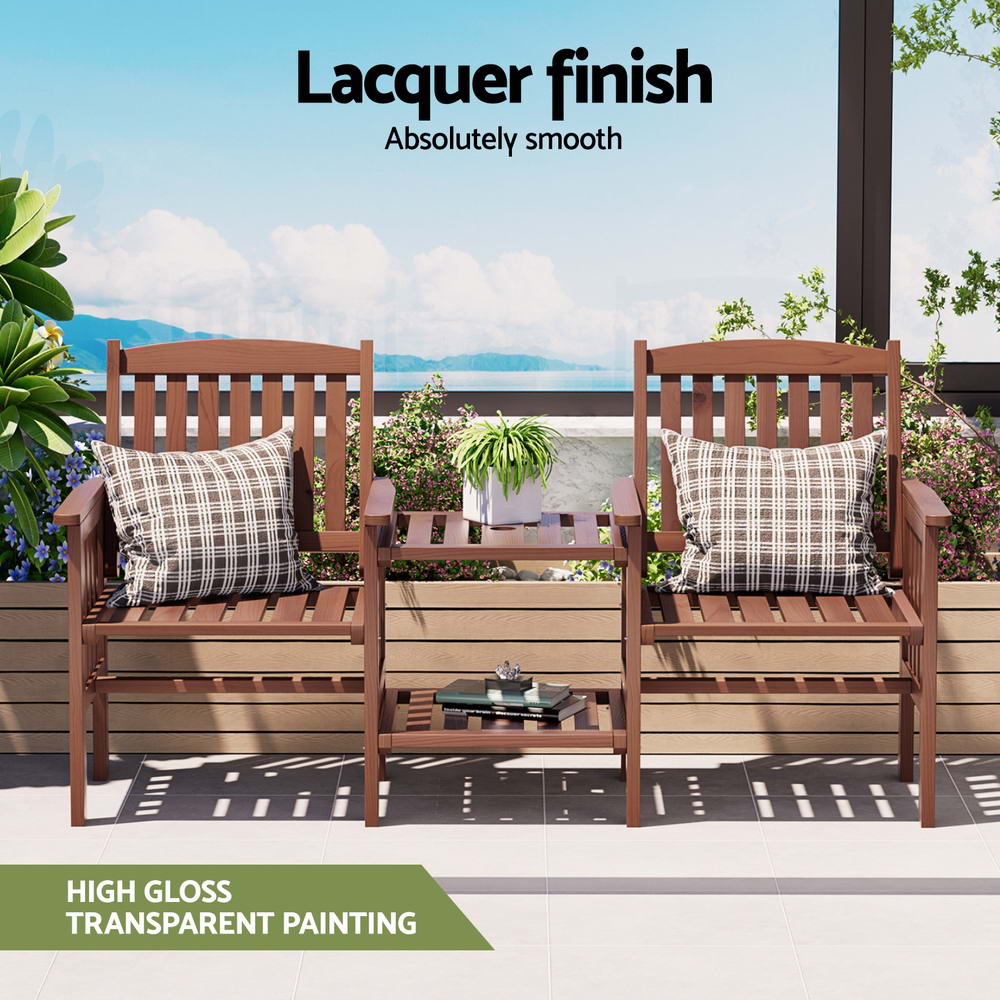Brown wooden outdoor chair set with two armchairs, patterned cushions, and slatted center table