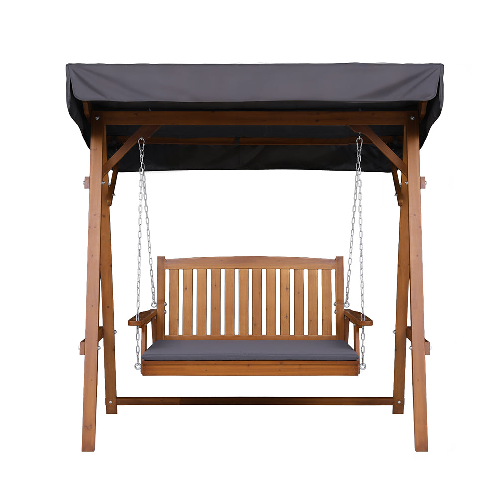 Outdoor wooden swing bench with canopy and hanging chains, with dark gray seat cushion