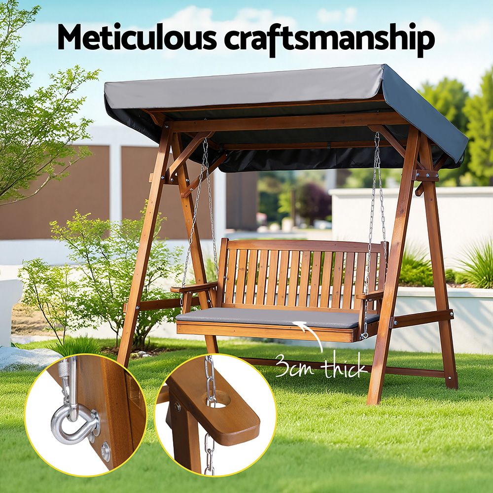 Outdoor wooden swing chair bench with gray canopy and thick seat cushion, hanging chains