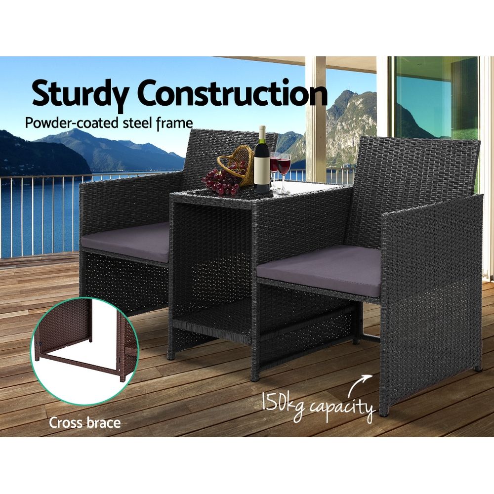 Black wicker loveseat set with gray cushions and square tabletop for patio use