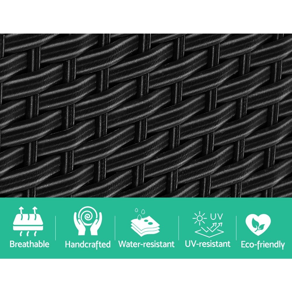 Black woven wicker panel detail with tight interlaced pattern