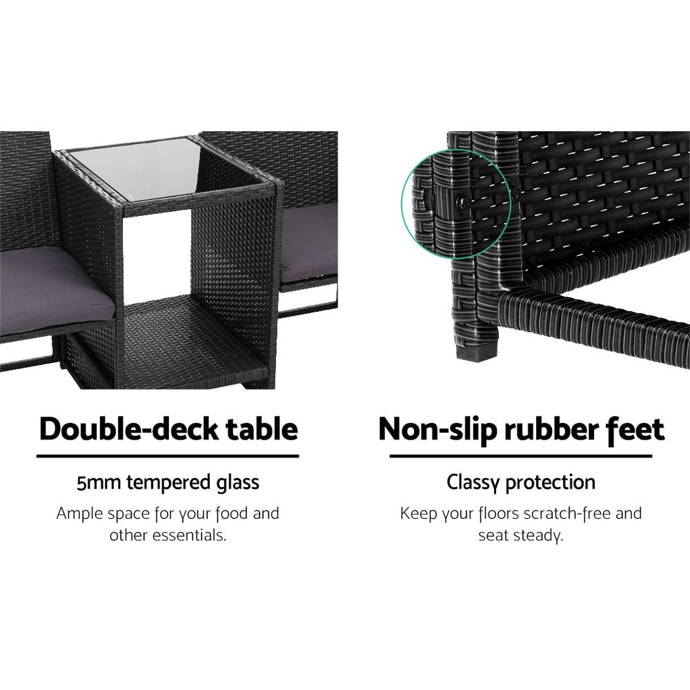 Black wicker loveseat with gray cushions and non-slip rubber feet detail