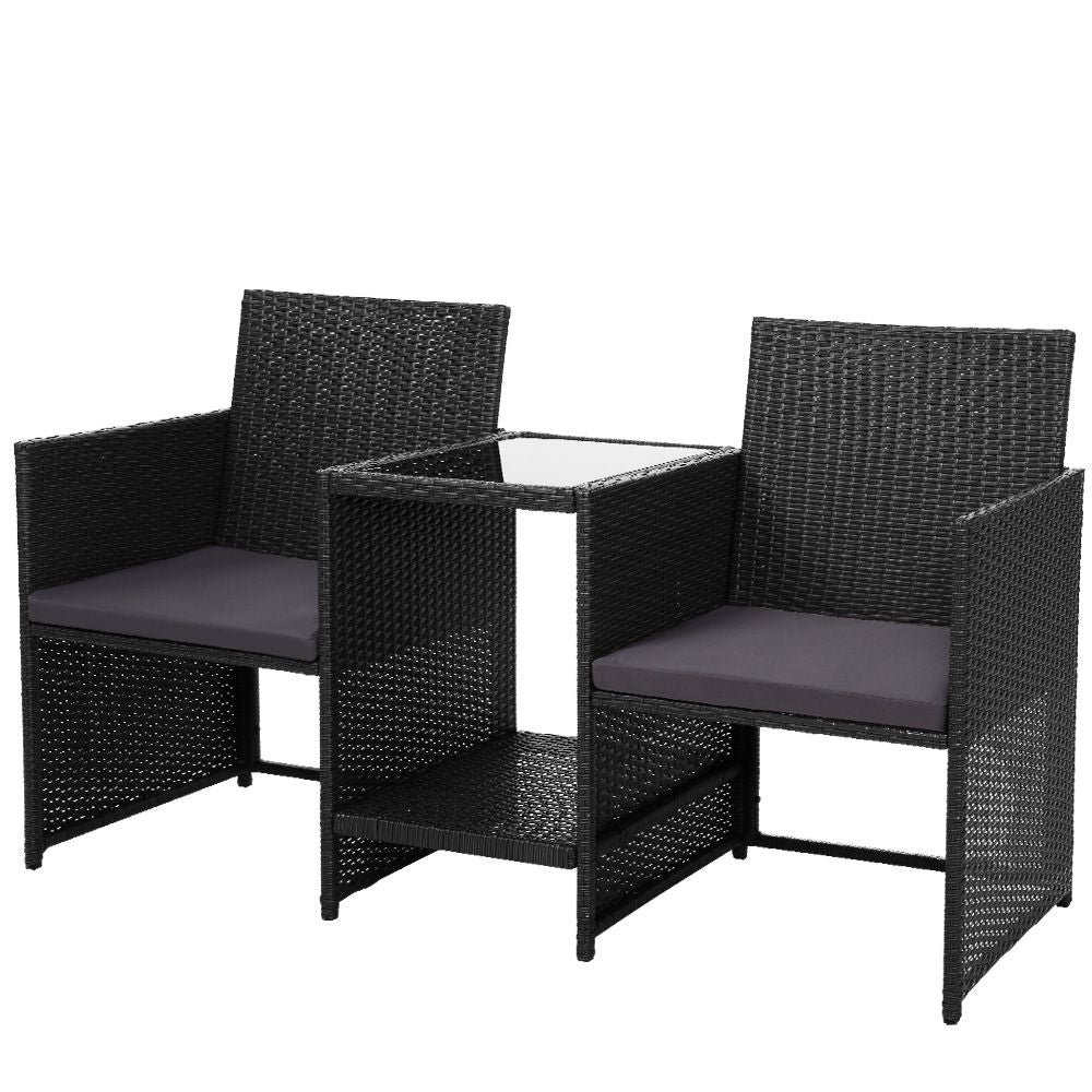 Black wicker loveseat chairs with gray cushions and square glass-top side table