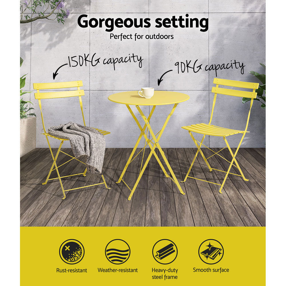 Yellow outdoor bistro set with round table and two folding chairs