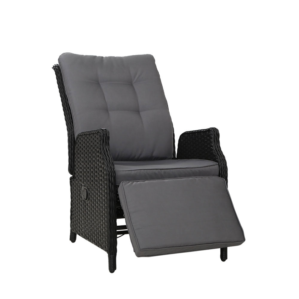 Outdoor recliner lounge chair with black wicker and gray padded backrest and seat