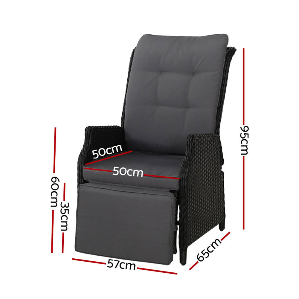 Outdoor recliner chair with gray cushion, black wicker frame, and adjustable footrest