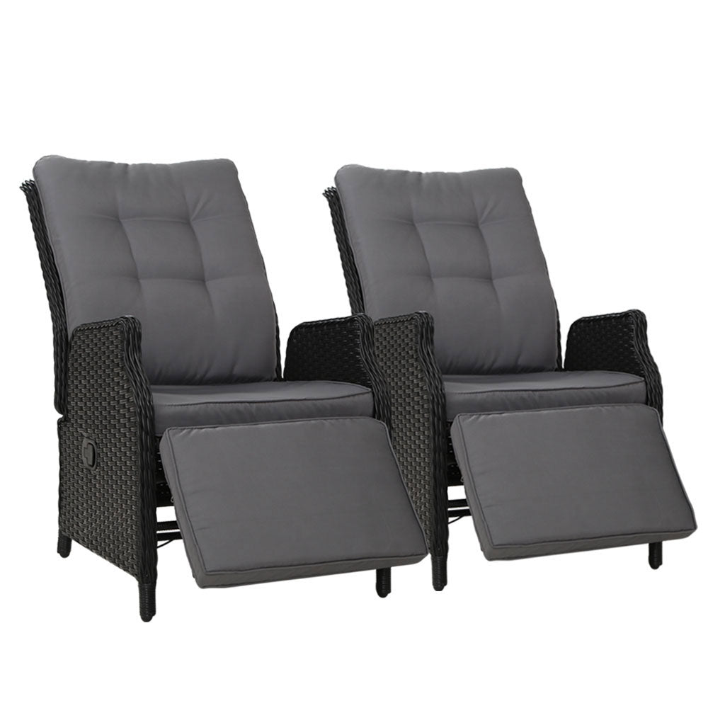 2-piece outdoor recliner chair set with gray cushions, black wicker frames, and two footrests
