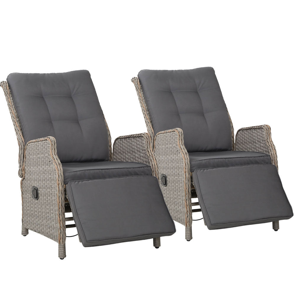 Two outdoor recliner chairs with gray cushions and light woven wicker frames, front view