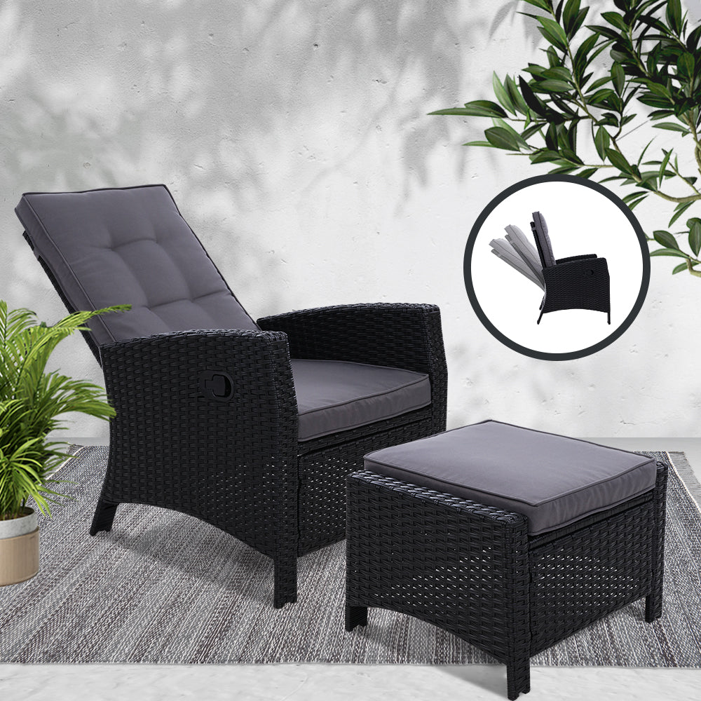 Outdoor recliner chair with black wicker and gray cushions plus matching gray-top ottoman