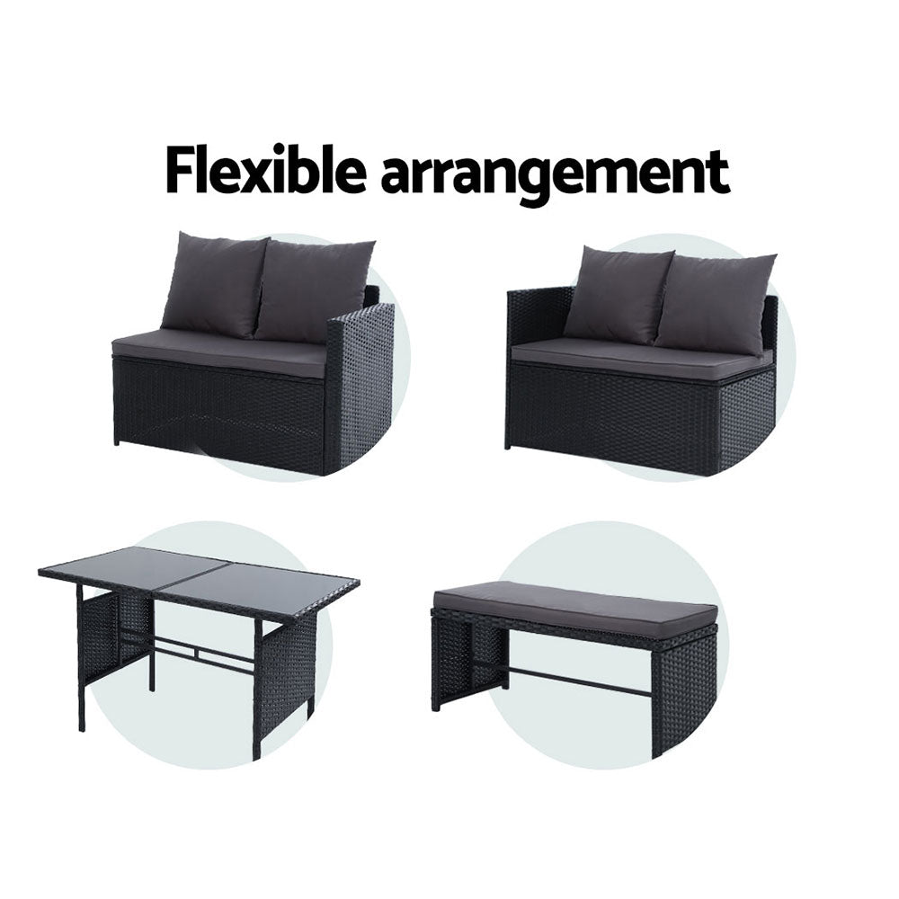 Modular black wicker lounge set with gray cushions and two coordinating dining tables