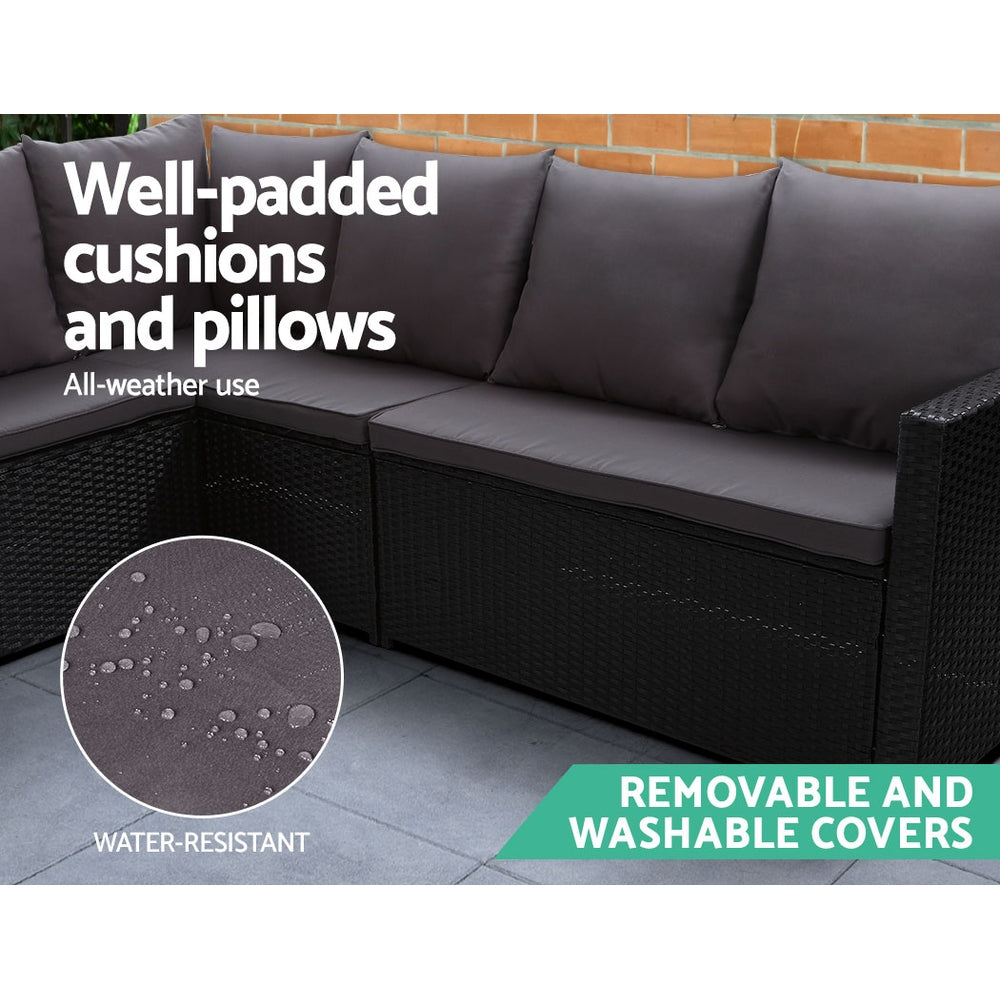 Black outdoor sofa set with gray padded cushions and removable washable covers