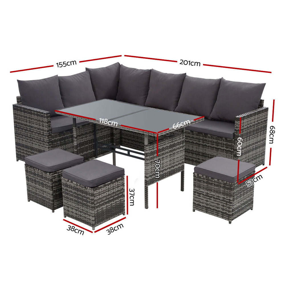Outdoor corner seating set with dark gray cushions, ottomans, and rectangular table