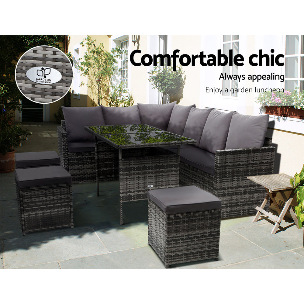 Grey cushioned outdoor corner sofa with glass-top table and matching ottomans