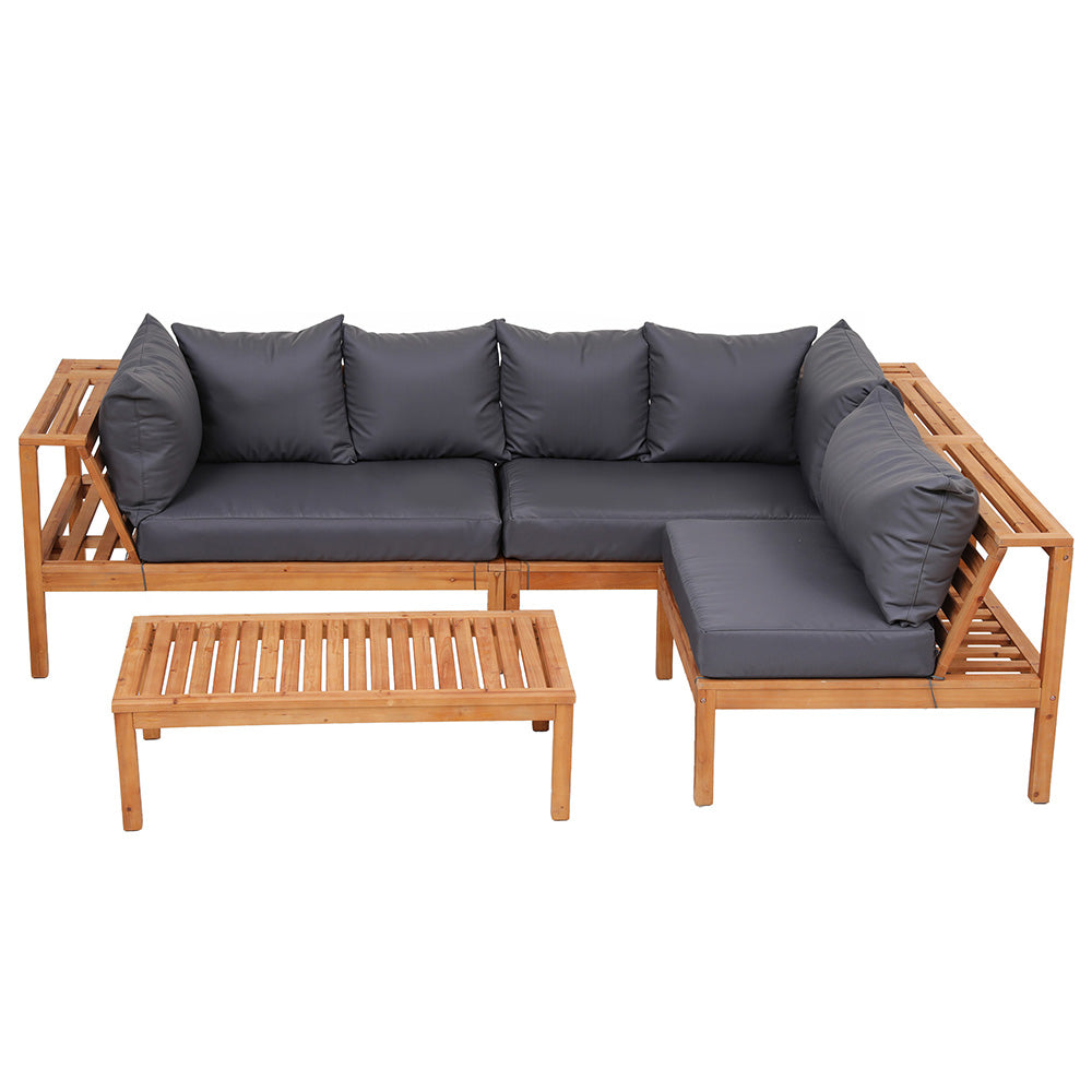 Outdoor L-shaped sofa with dark gray cushions, light wood arms, and slatted coffee table