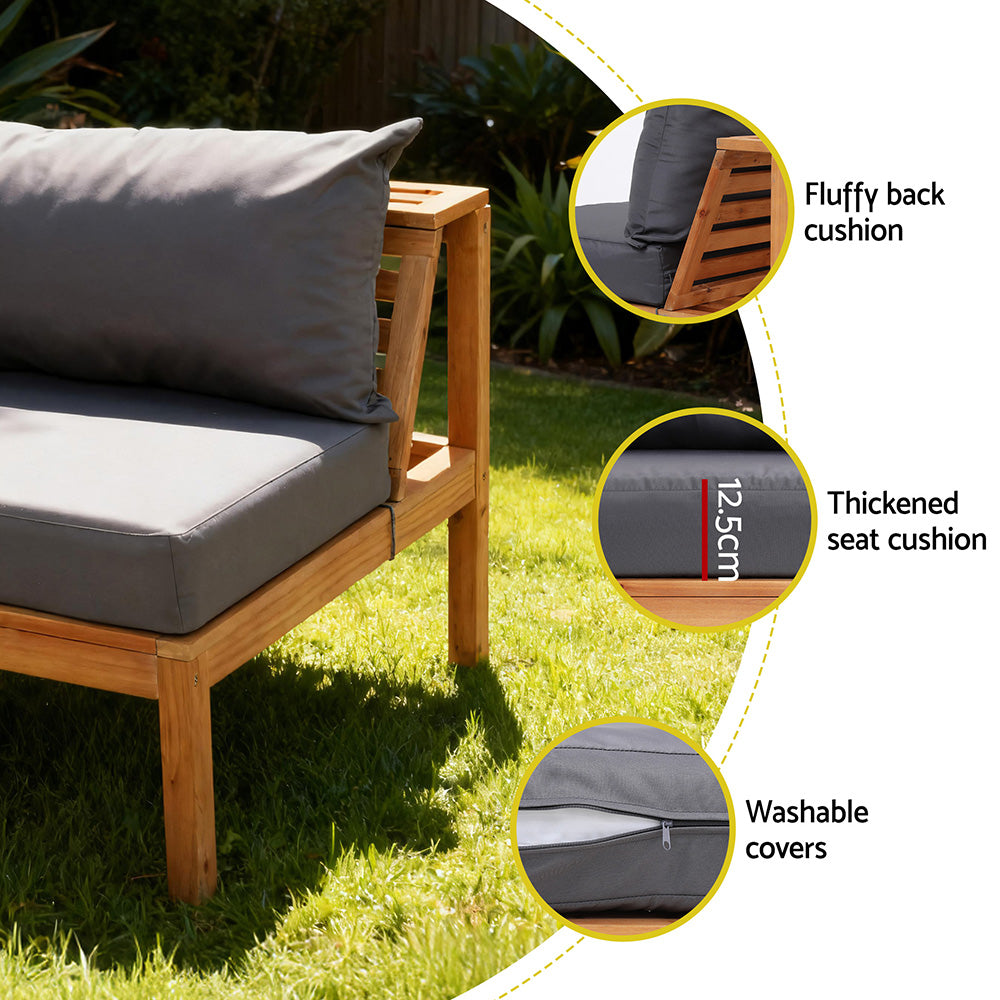 Thick back sofa cushion in dark gray on light wood frame with washable covers