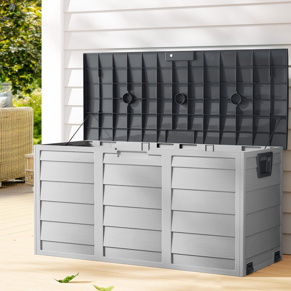 Lockable outdoor storage box with dark grey hinged lid, vented lock panel.
