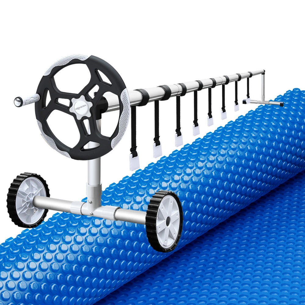 Blue solar pool cover blanket with roller reel and black mounting frame