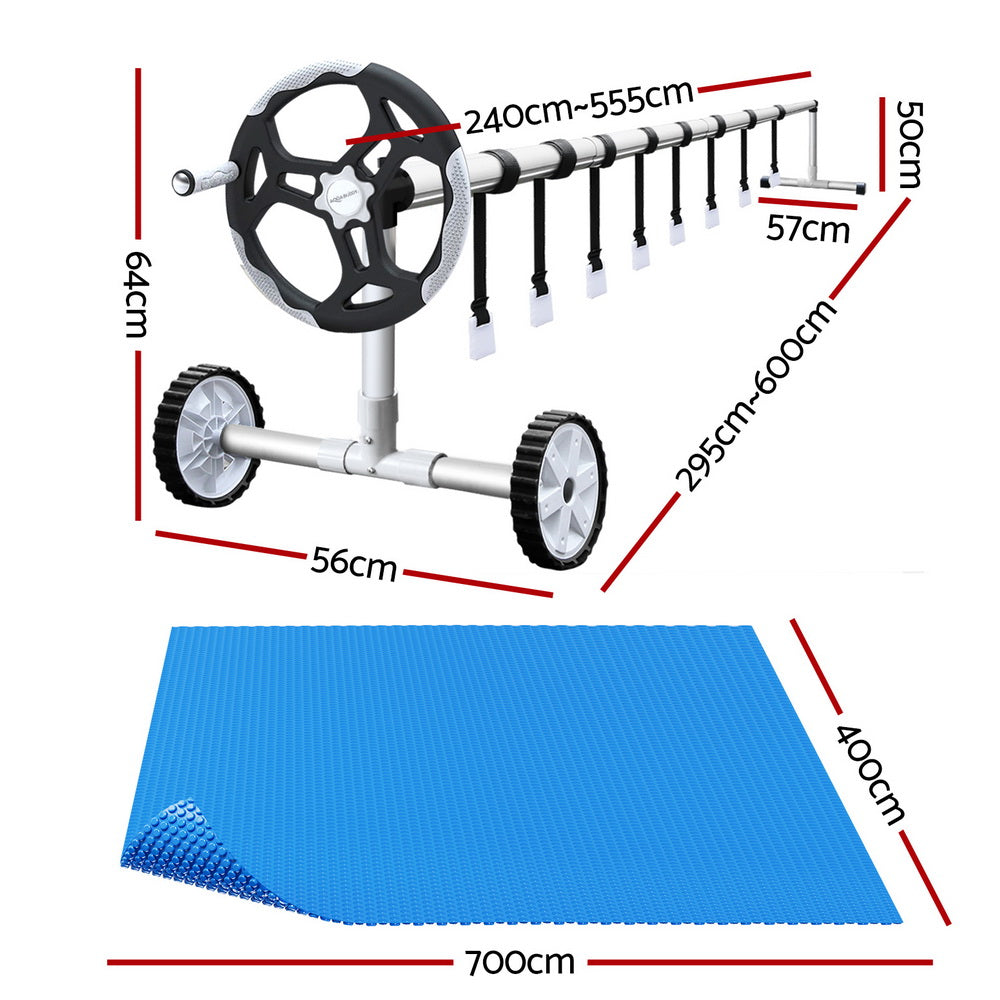 Blue pool solar blanket with roller frame and side winding drums